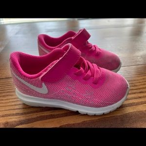 7C pink Nike runners